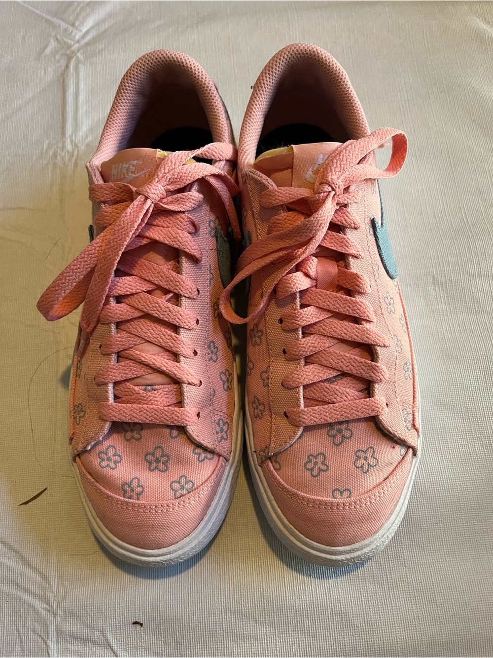 Nike Pink Canvas Sneakers with Blue Swoosh and Floral Print
